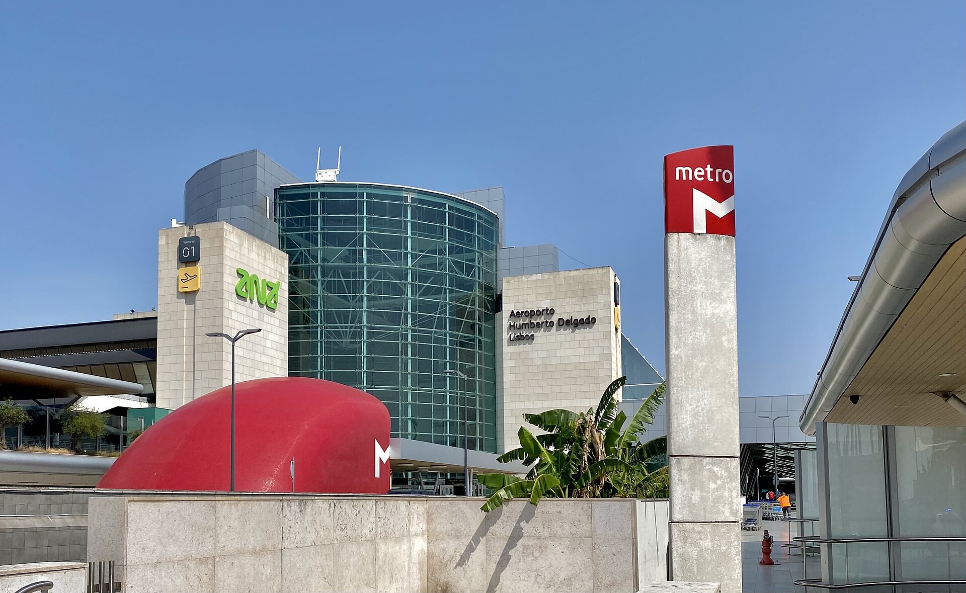 Aeroporto Humberto Delgado terminal building and Lisbon Metro sign