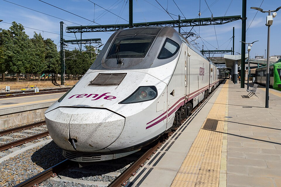 Renfe high-speed train at a station platform in Badajoz, Spain